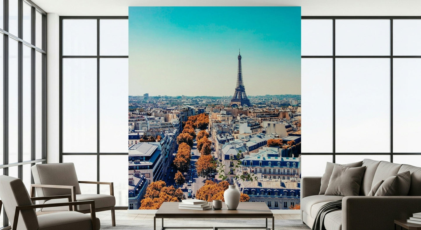 Fall in Paris wallpaper mural with Eiffel Tower behind a grey sofa and armchairs by tall windows