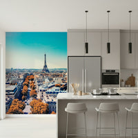 Fall in Paris wallpaper mural of the autumn skyline beside a marble kitchen island with bar stools