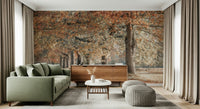 Fall foliage path wall mural with tall trees