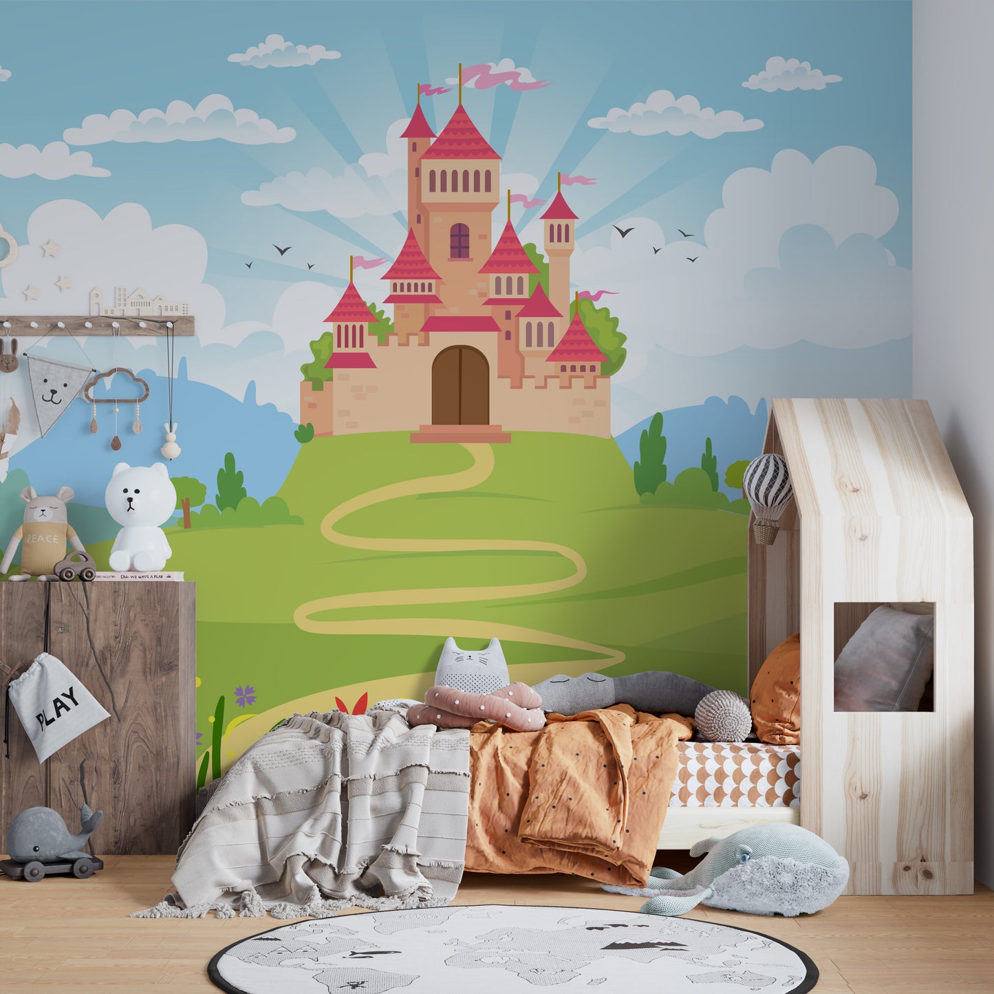 Fantacy Castle wallpaper with a pink castle on a green hill in a kids room with a house-frame bed and white bear lamp