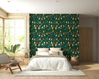 Bright holiday bulbs scattered across a deep green wallpaper with whimsical swirling wires.
