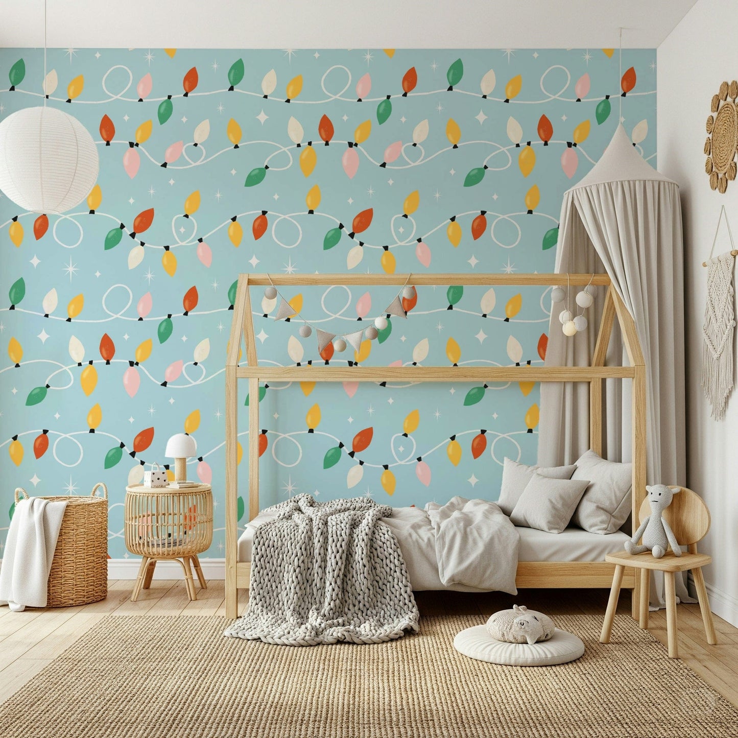 A whimsical wallpaper showcasing vibrant Christmas lights and star accents over a light blue base.