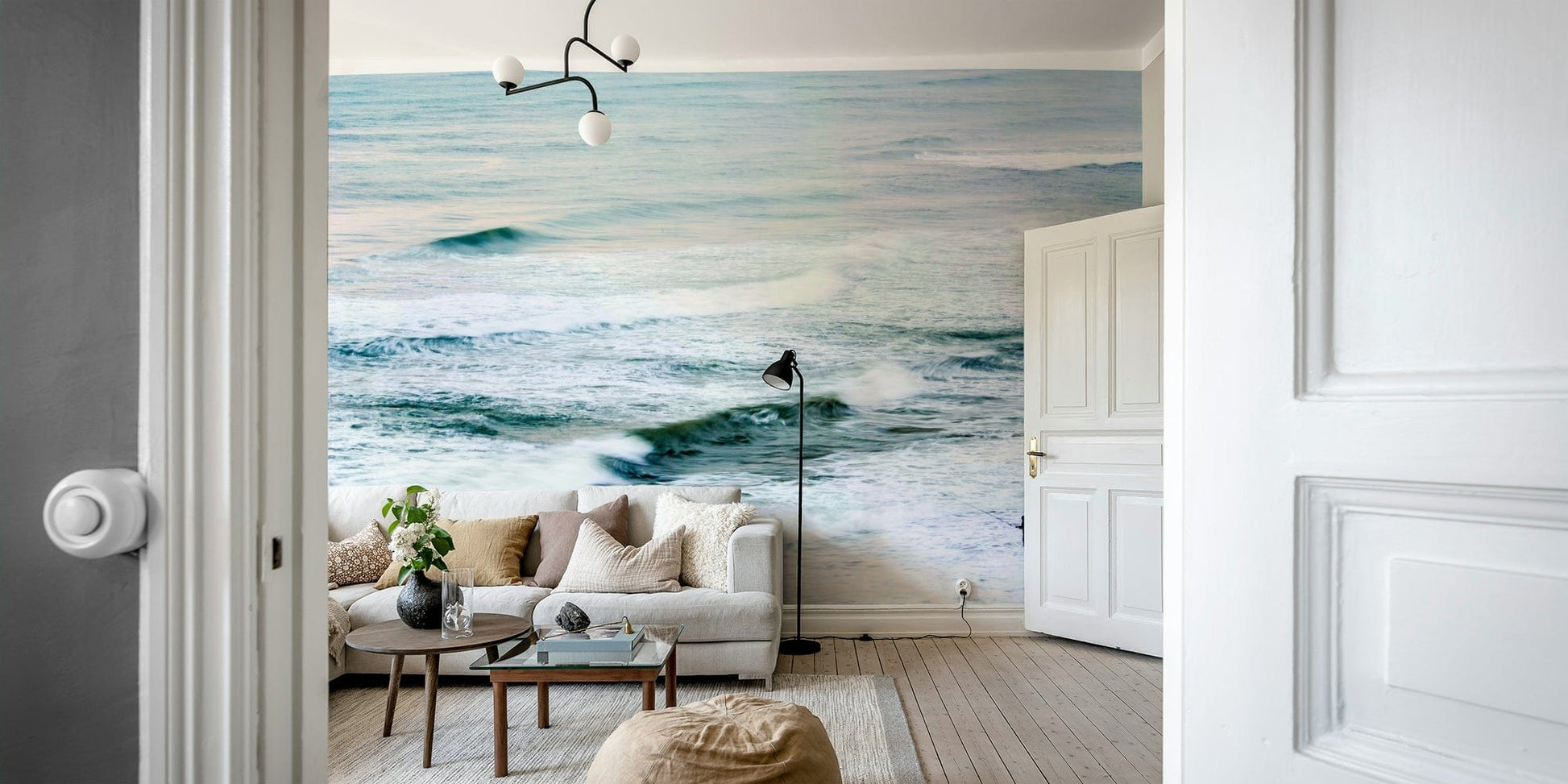 A peaceful open ocean mural on decorative wallpaper.

