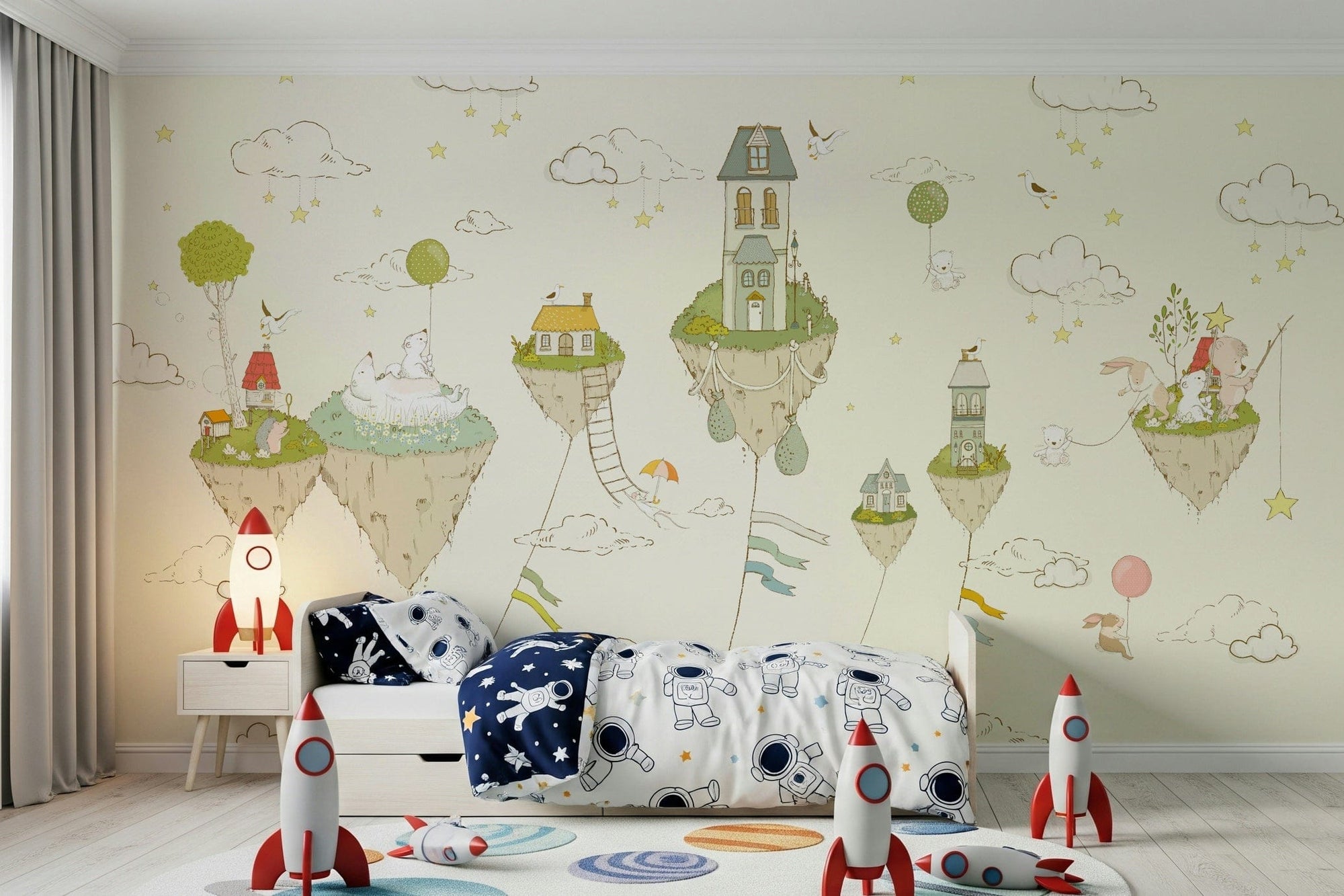 Floating Dreamland Homes wallpaper mural of cream floating islands by a white bed with astronaut bedding and rocket toys