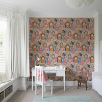 Floral bear wallpaper behind crib in nursery, calm beige and pink color tones