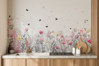 Serene Floral Orchard wallpaper mural styled as a feature wall behind a dining table and chairs in pink tones