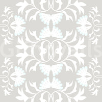 Graceful white vine wall mural over solid light grey.