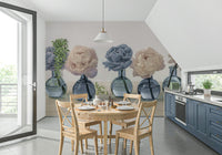Floral Vases wallpaper mural of peonies behind a round wood dining table with blue kitchen cabinets