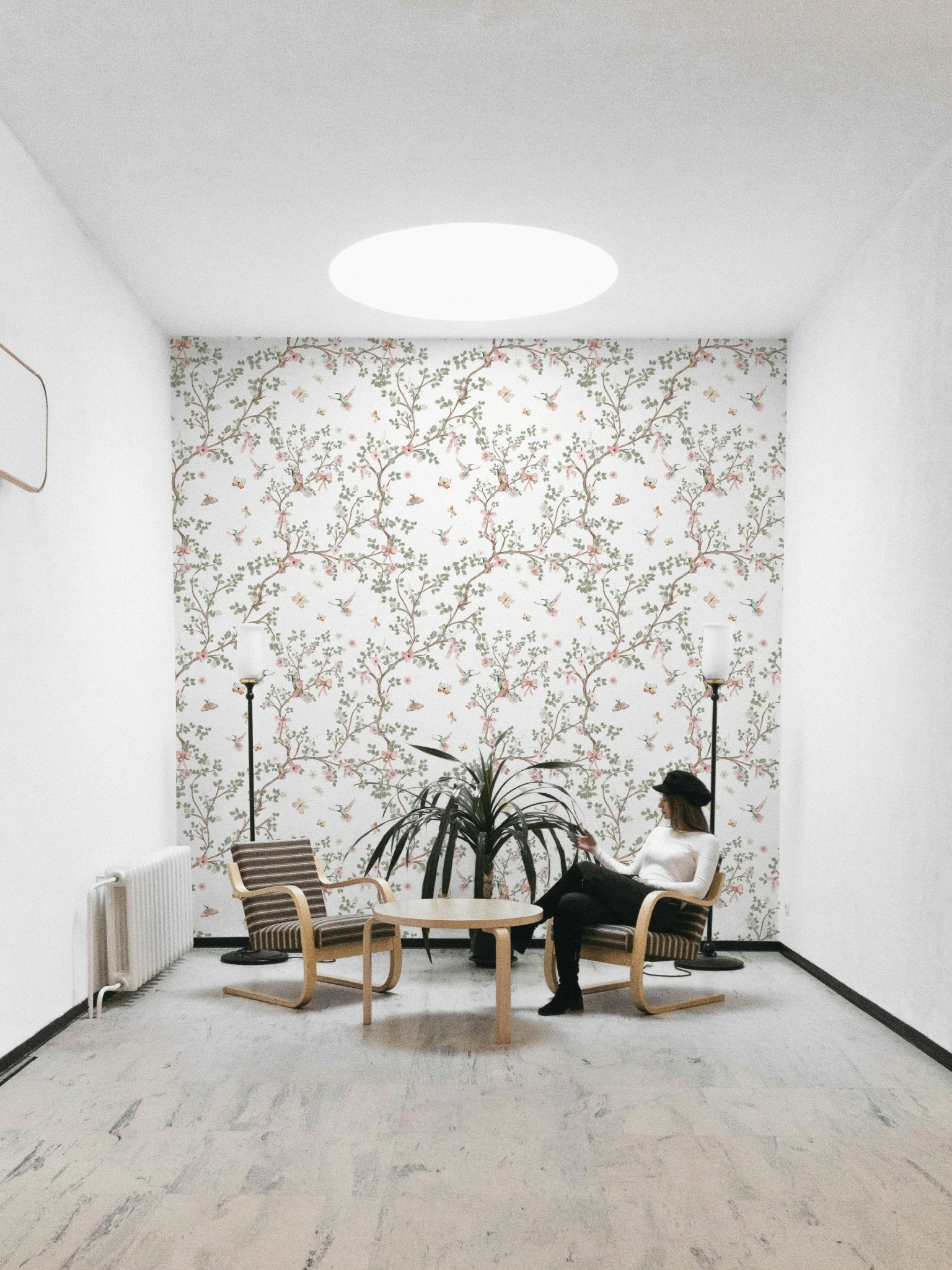Birds and flowers rendered in a sophisticated style.

