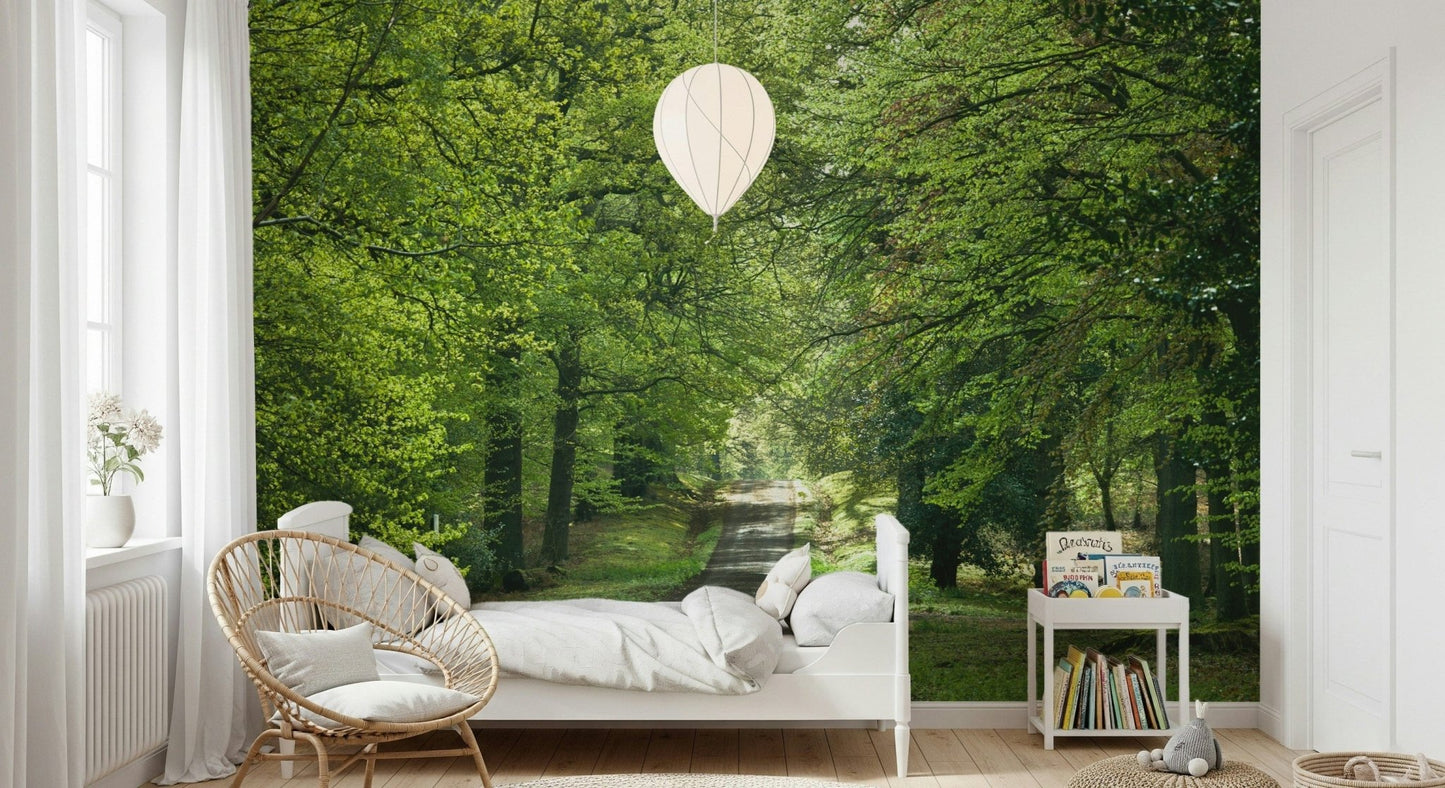 Vibrant green trees wall mural with pathway