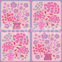 Pretty pink and fuchsia floral wallpaper in a bright flat lounge.