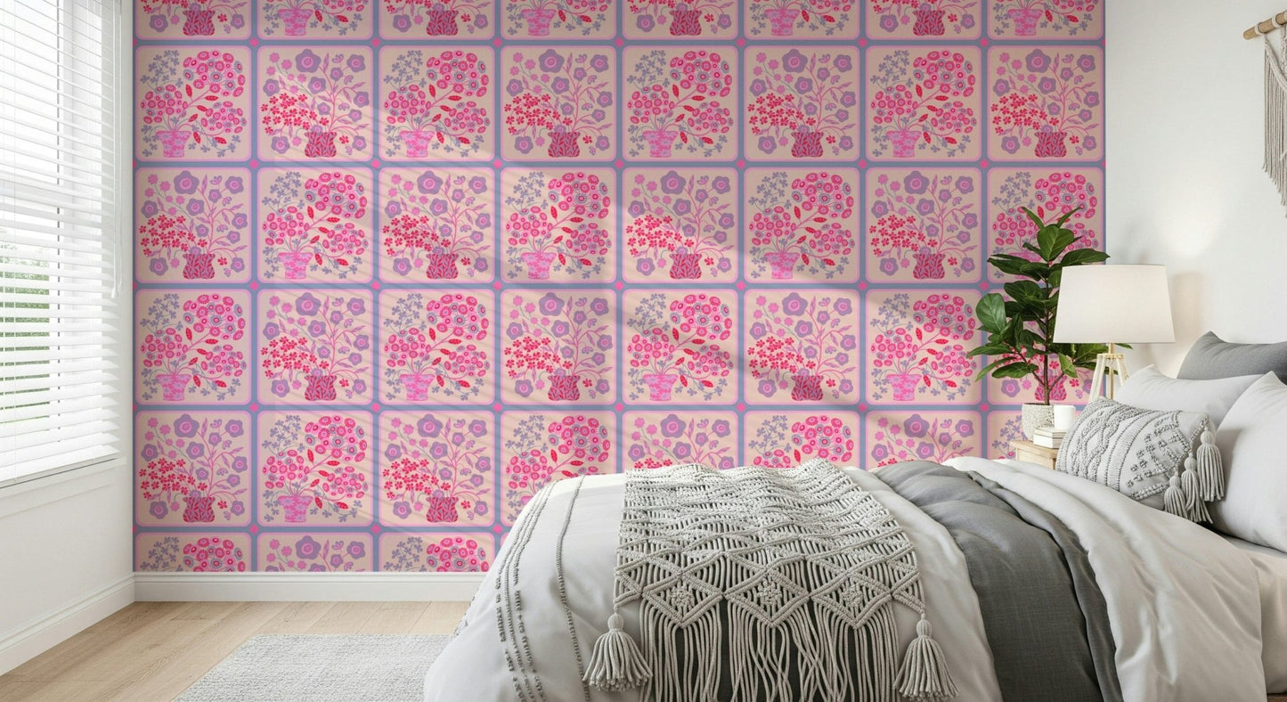 Fuchsia and red flower wallpaper in a bright studio apartment kitchen area.
