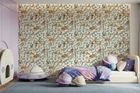 Woodland animals and foliage wallpaper in nursery, gentle color tones, statement wall