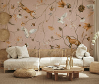 Decorative mural featuring owls, foxes, and deer in a magical woodland