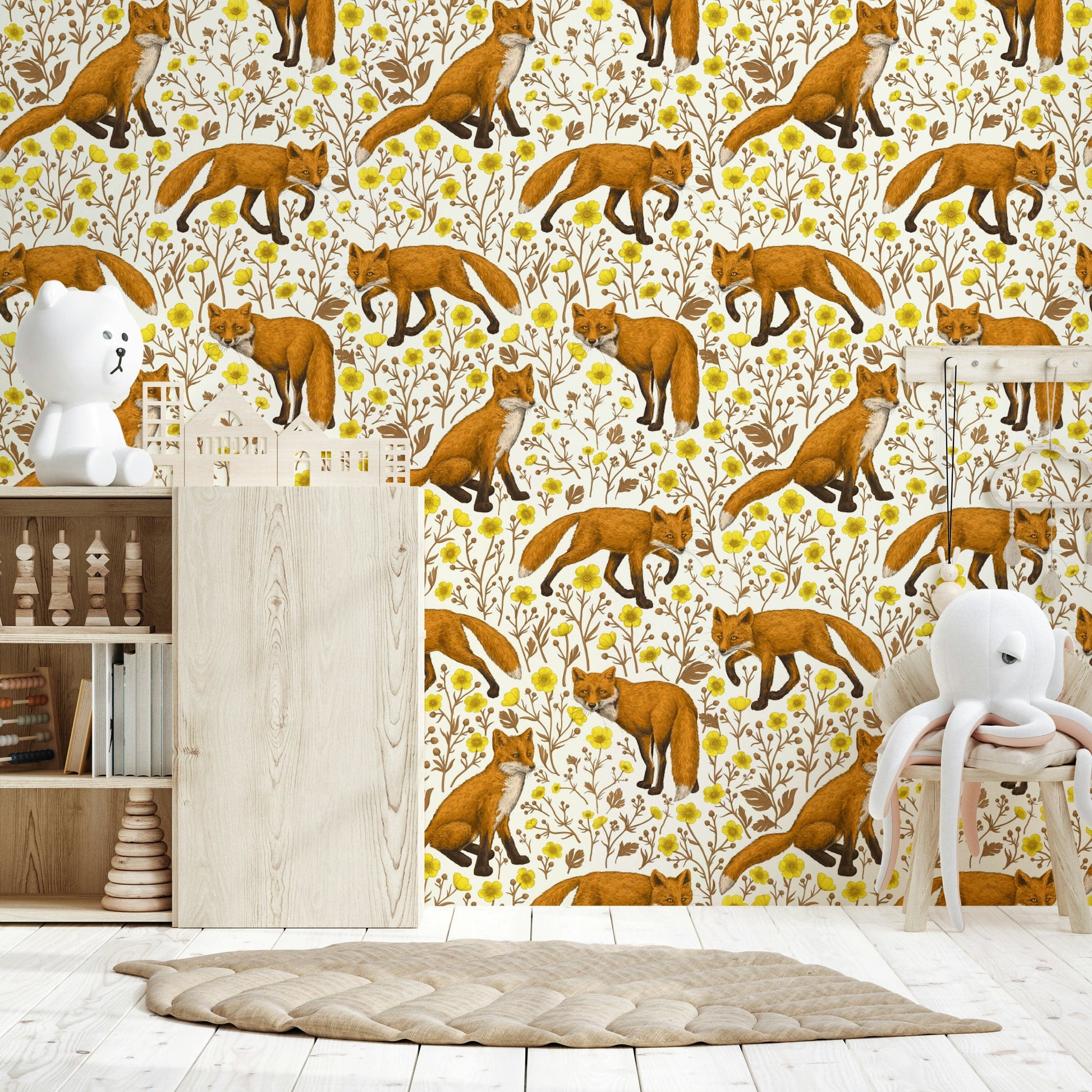 Foxes and Buttercups Wallpaper featuring playful foxes among yellow buttercup flowers on a natural white background.
