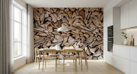 Fractured Timber wallpaper mural of cut logs behind a light wood dining table in a bright white kitchen