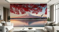 Ocean-sky ombré mural in bedroom, calming blue tones above white headboard