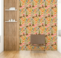 Stylized flowers and birds in pink, green, and brown

