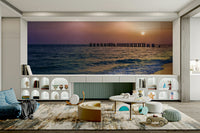 Serene beach scene mural with sunset glow

