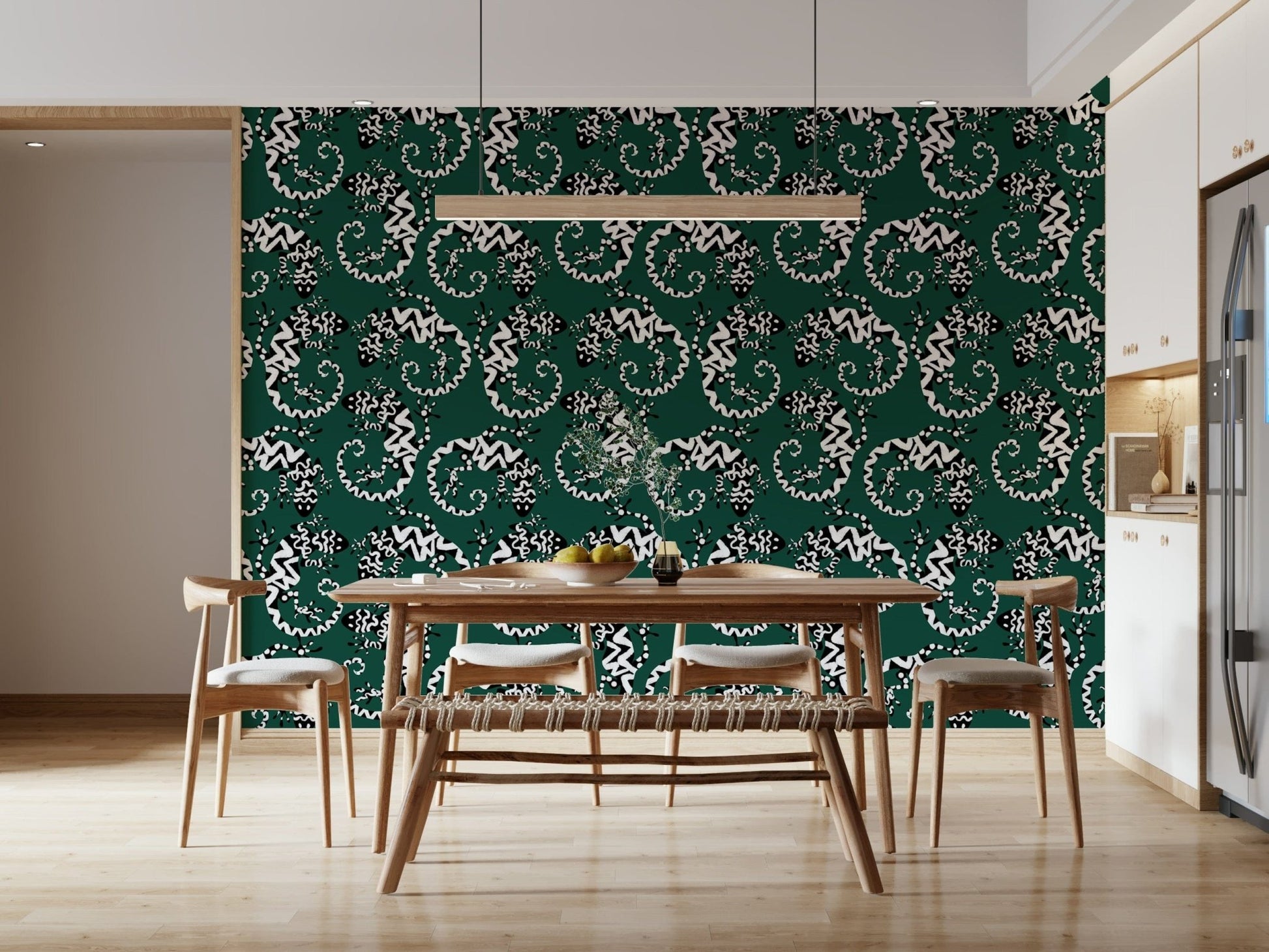 Gecko Groove wallpaper in green and white on a kitchen wall behind a wooden dining table and chairs