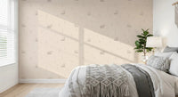 Bedroom with soft bear meadow wallpaper in warm neutral shades