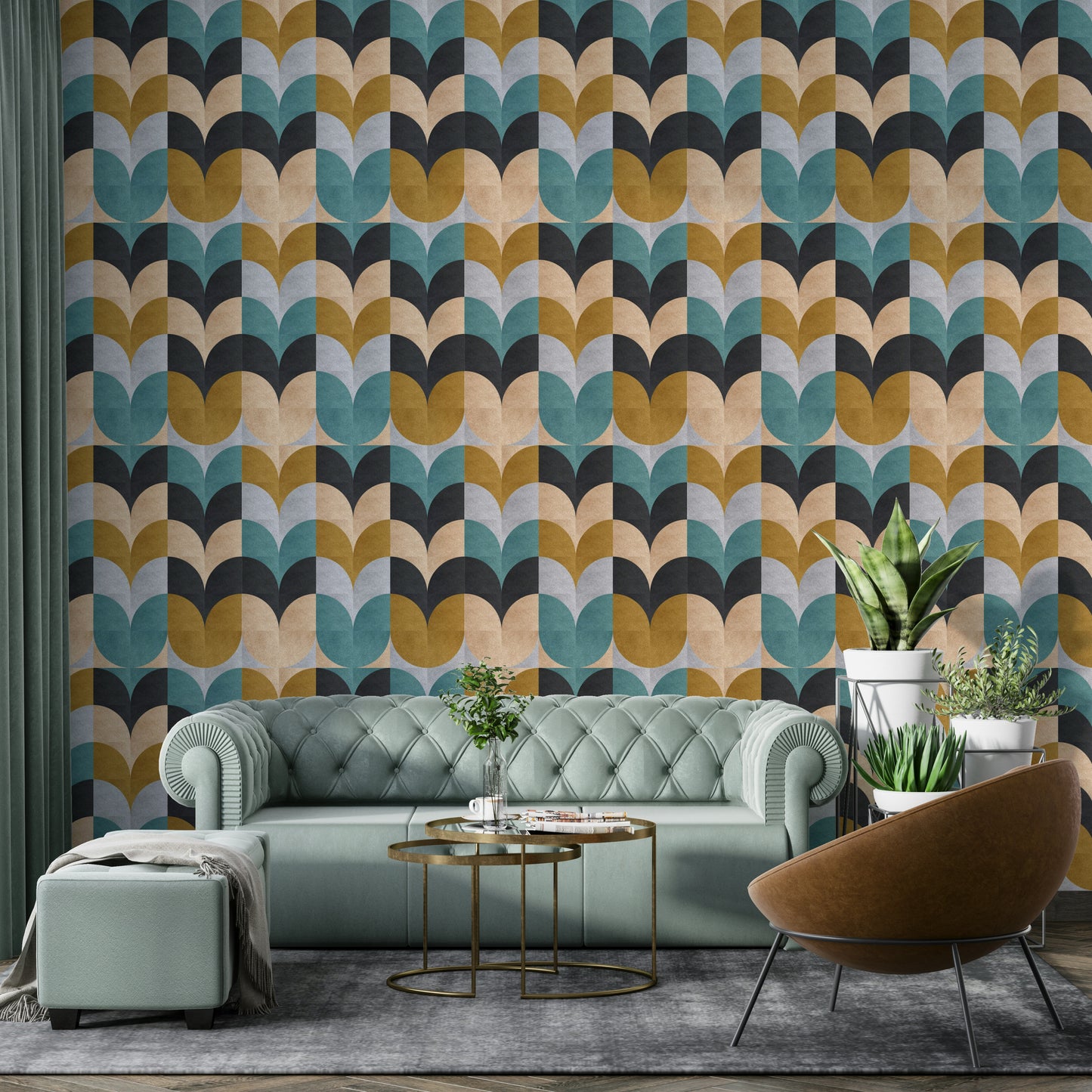 Geometric Art wallpaper of teal and ochre shapes behind a sage Chesterfield sofa and leather chair in a lounge