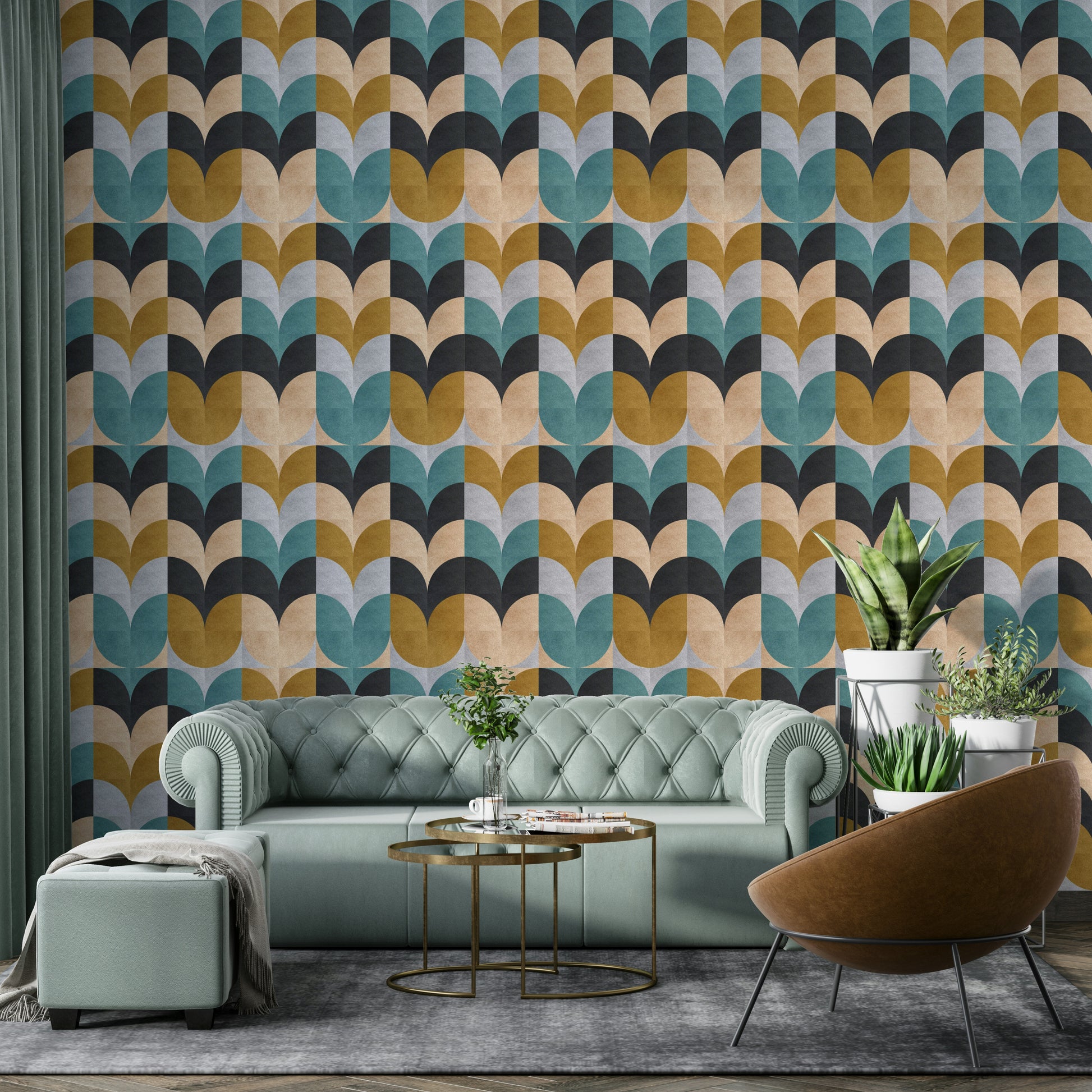 Geometric Art wallpaper of teal and ochre shapes behind a sage Chesterfield sofa and leather chair in a lounge