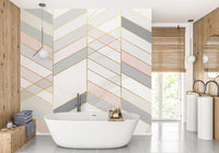 Geometric Shape Golden Effect Marble wallpaper mural behind a white freestanding bathtub in a bathroom