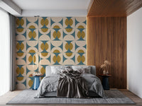 Patterned wallpaper with symmetric curved shapes in teal, cream, and ochre.
