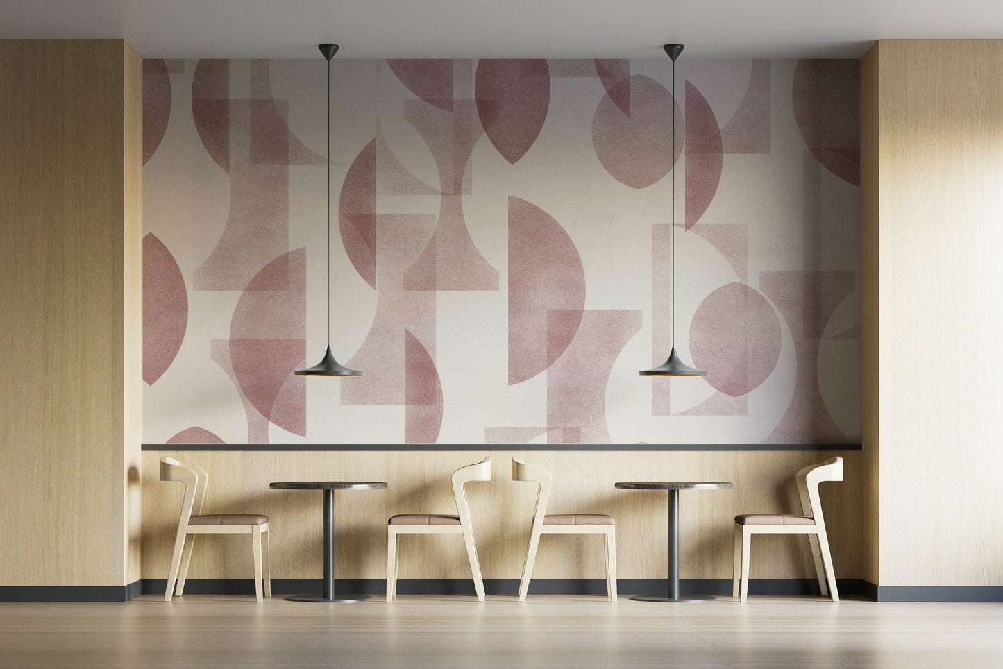 A dining area decorated with a geometric mural

