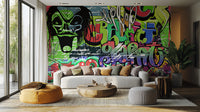 Vibrant Graffiti wallpaper mural behind a grey sofa, round wooden coffee table and mustard bean bag in a living room
