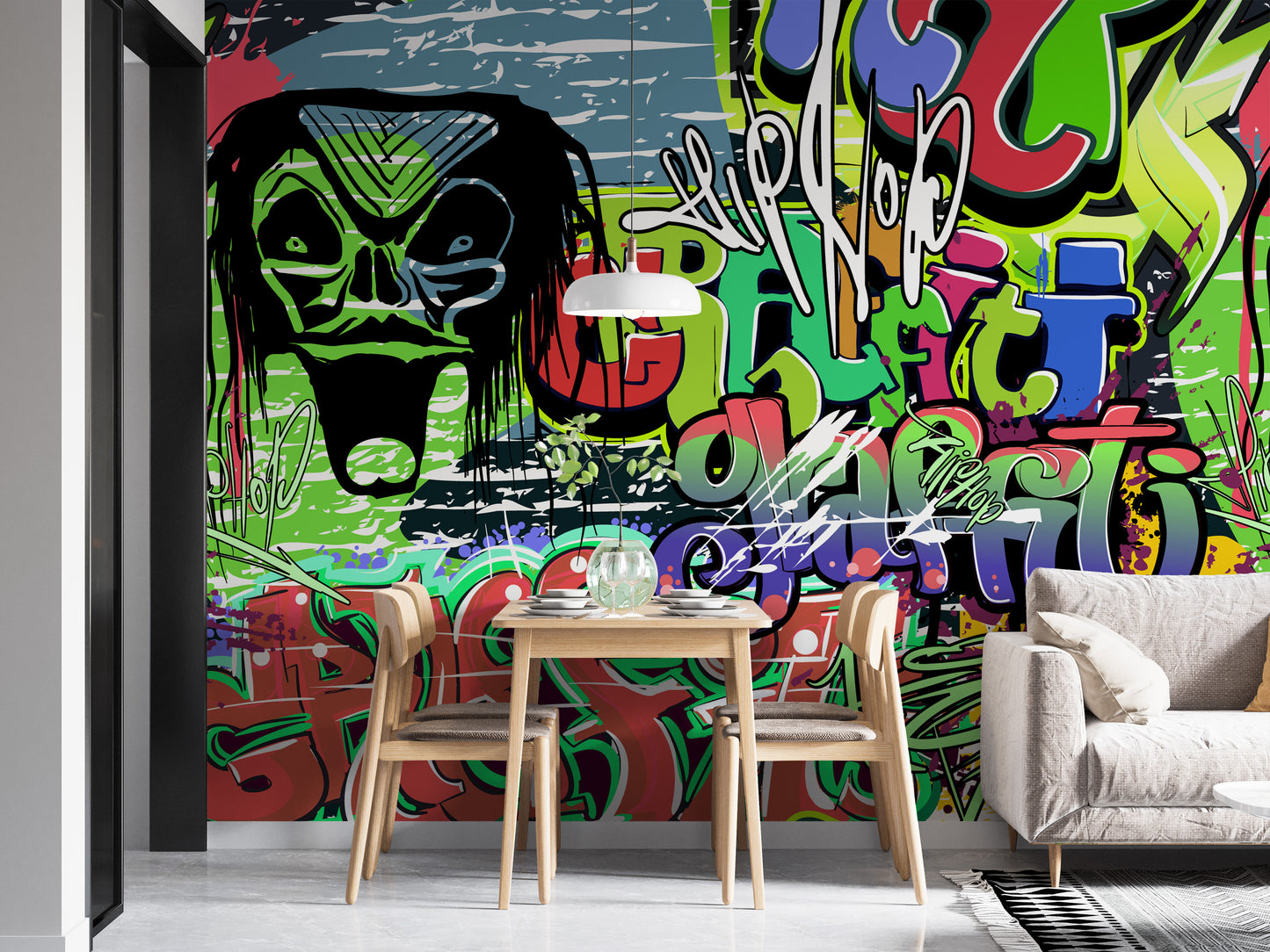 Vibrant Graffiti wallpaper mural with a green skull and bold street art in a dining nook with a wooden table and white sofa