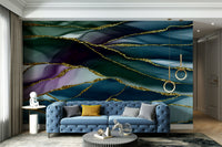 The wall art combines a flowing pattern with metallic accents.

