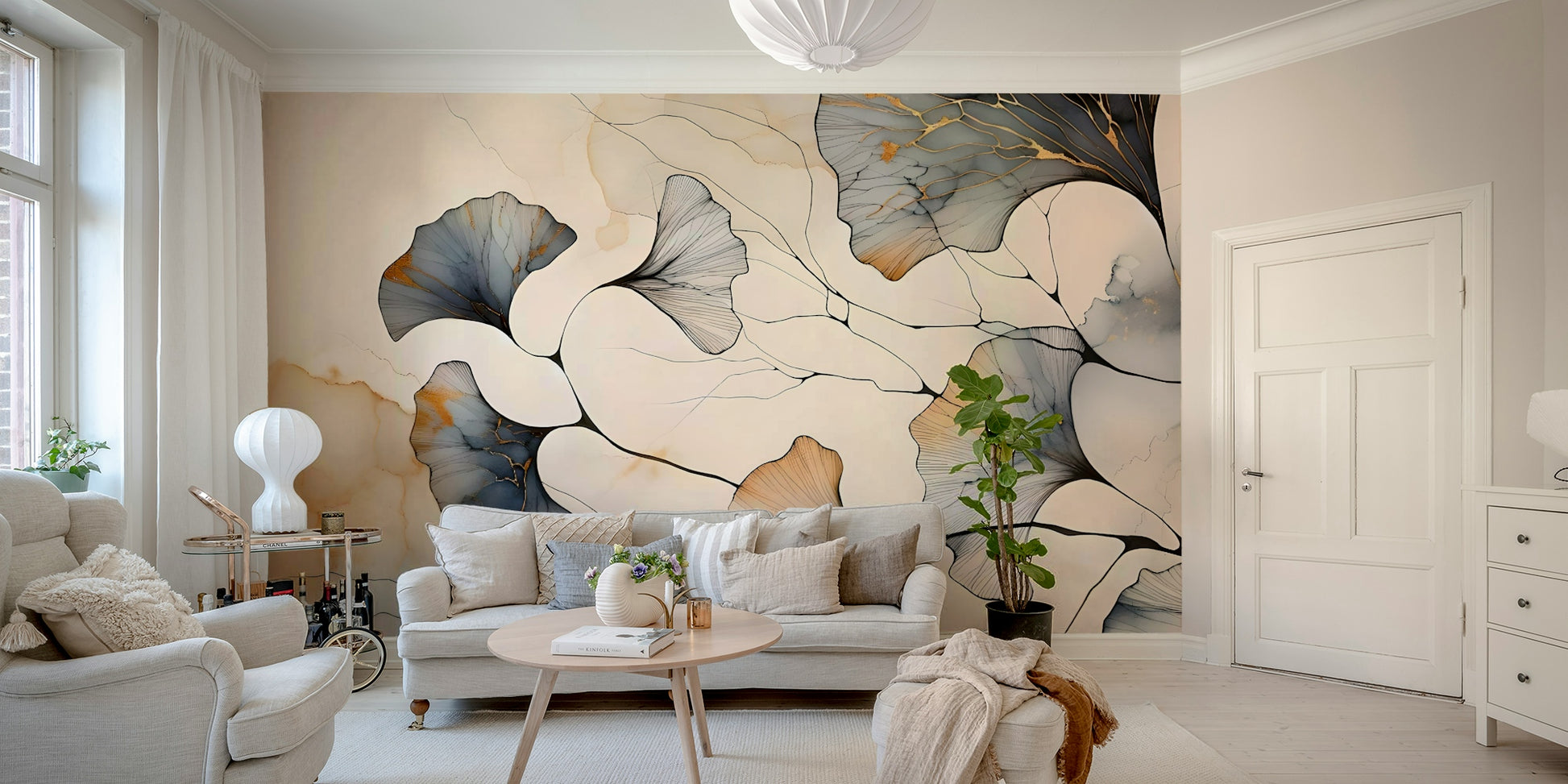 Metallic ginkgo leaf wallpaper for a sophisticated apartment feature wall.
