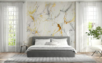 Decorative mural featuring swirling marble patterns accented with subtle gold shimmer.