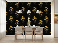 Ginkgo Luxury Gold wallpaper mural of gold ginkgo sprays on black behind a wood dining table and cream chairs