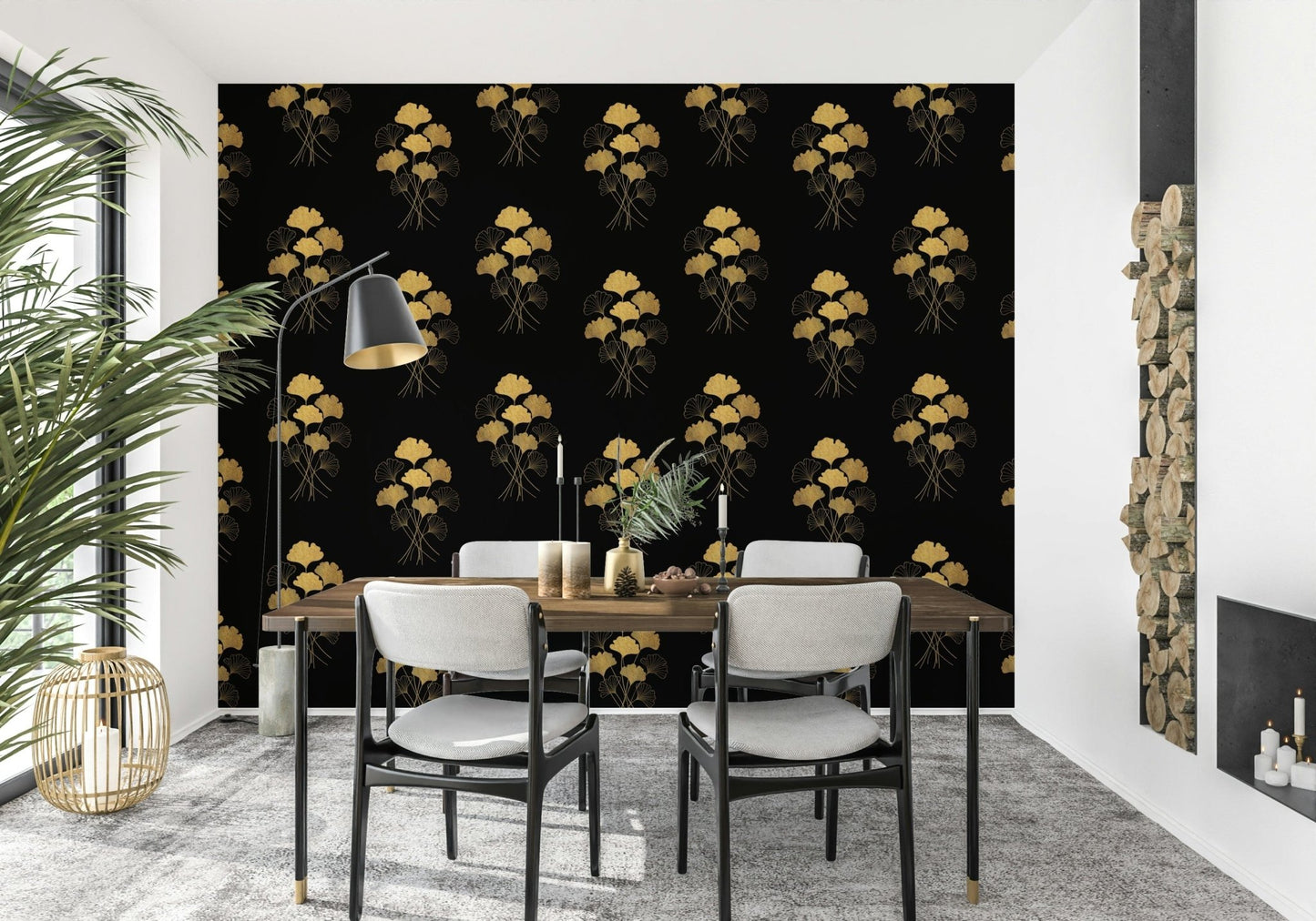 Ginkgo Luxury Gold wallpaper mural with gold ginkgo leaves on black behind a wood dining table and black-framed chairs