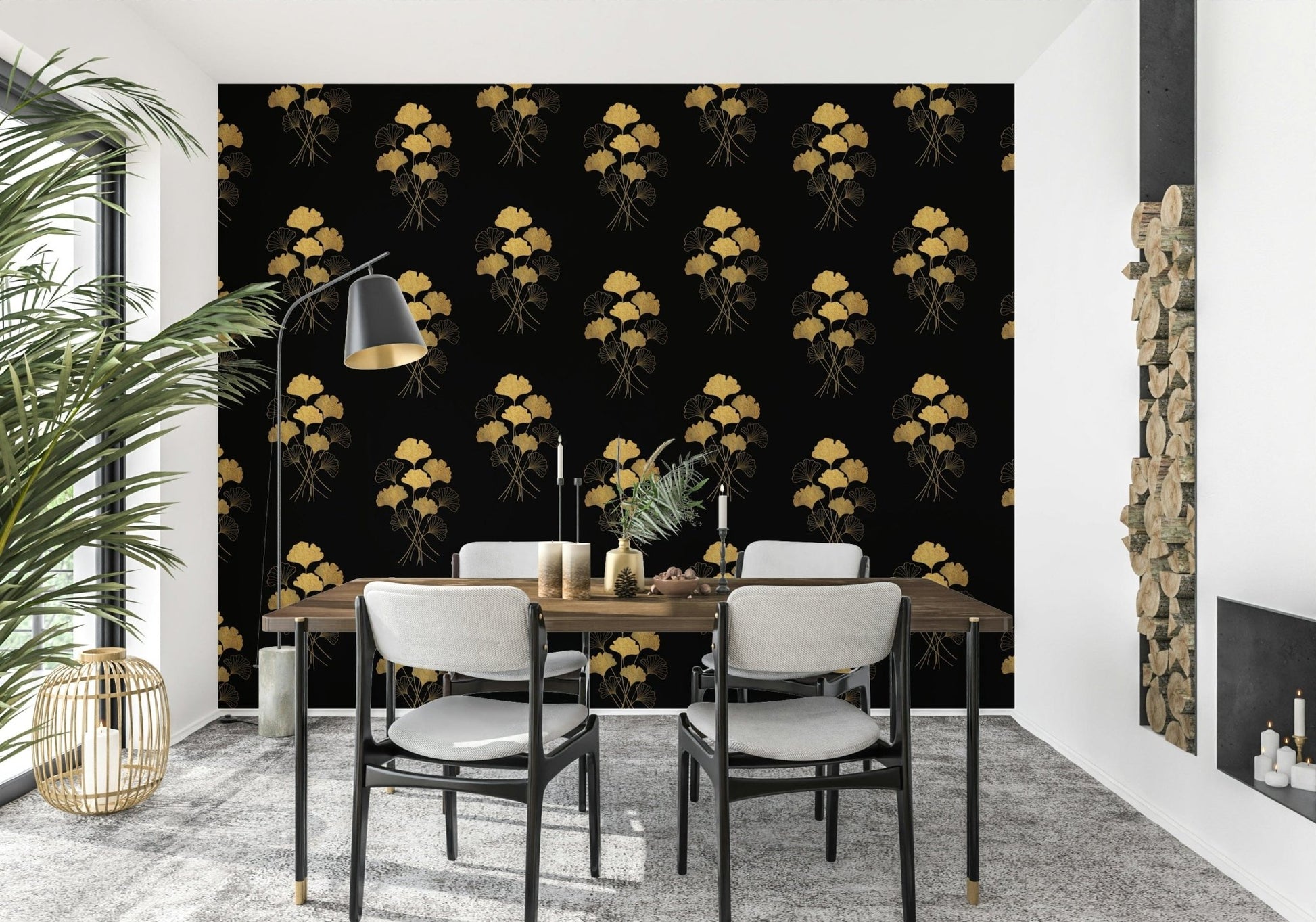 Ginkgo Luxury Gold wallpaper mural with gold ginkgo leaves on black behind a wood dining table and black-framed chairs
