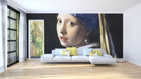 Girl Pearl Earring wallpaper mural styled as a feature wall behind a dining table and chairs in a multicolour palette