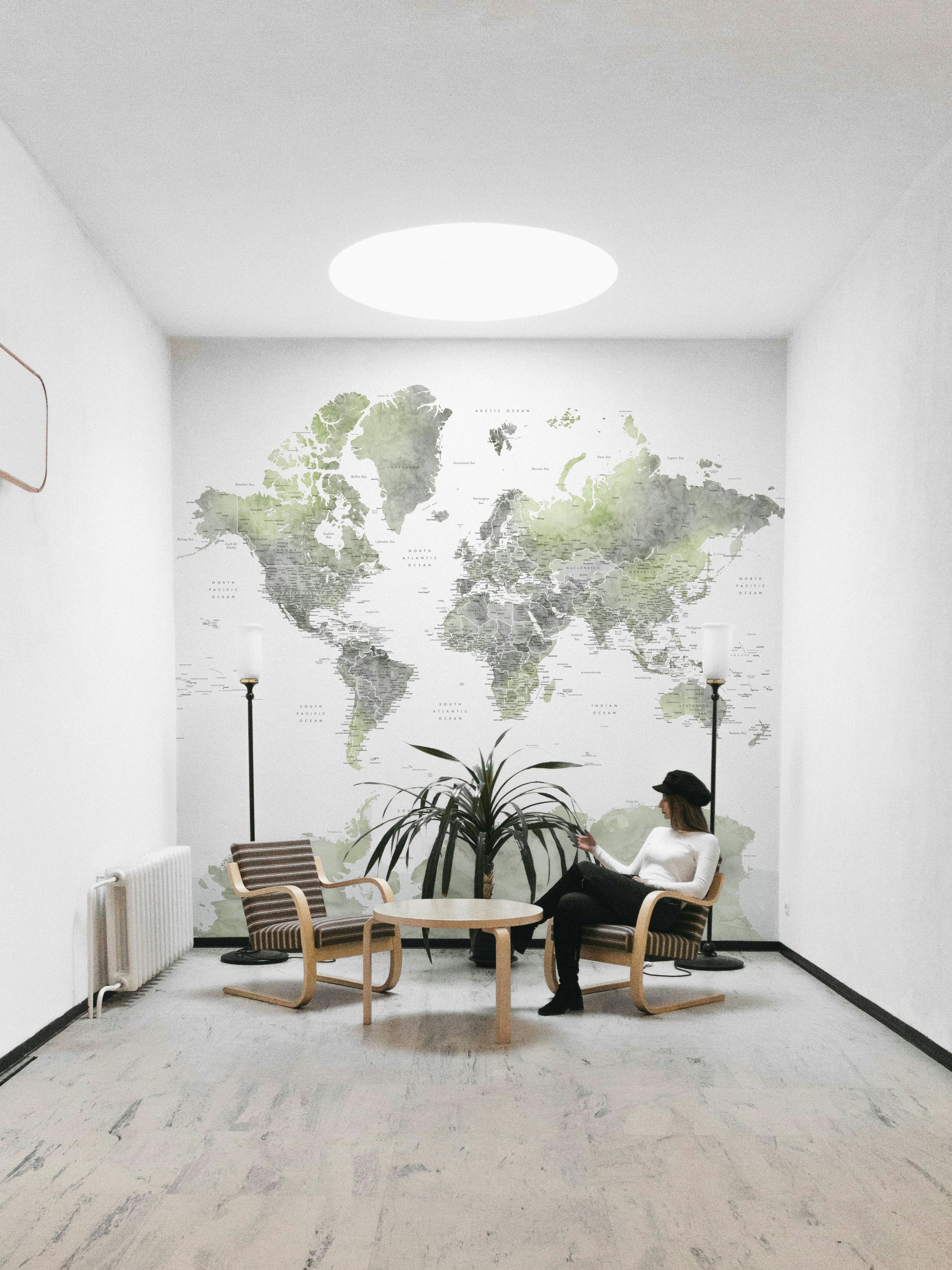 Green gradient world map wallpaper for modern rooms

