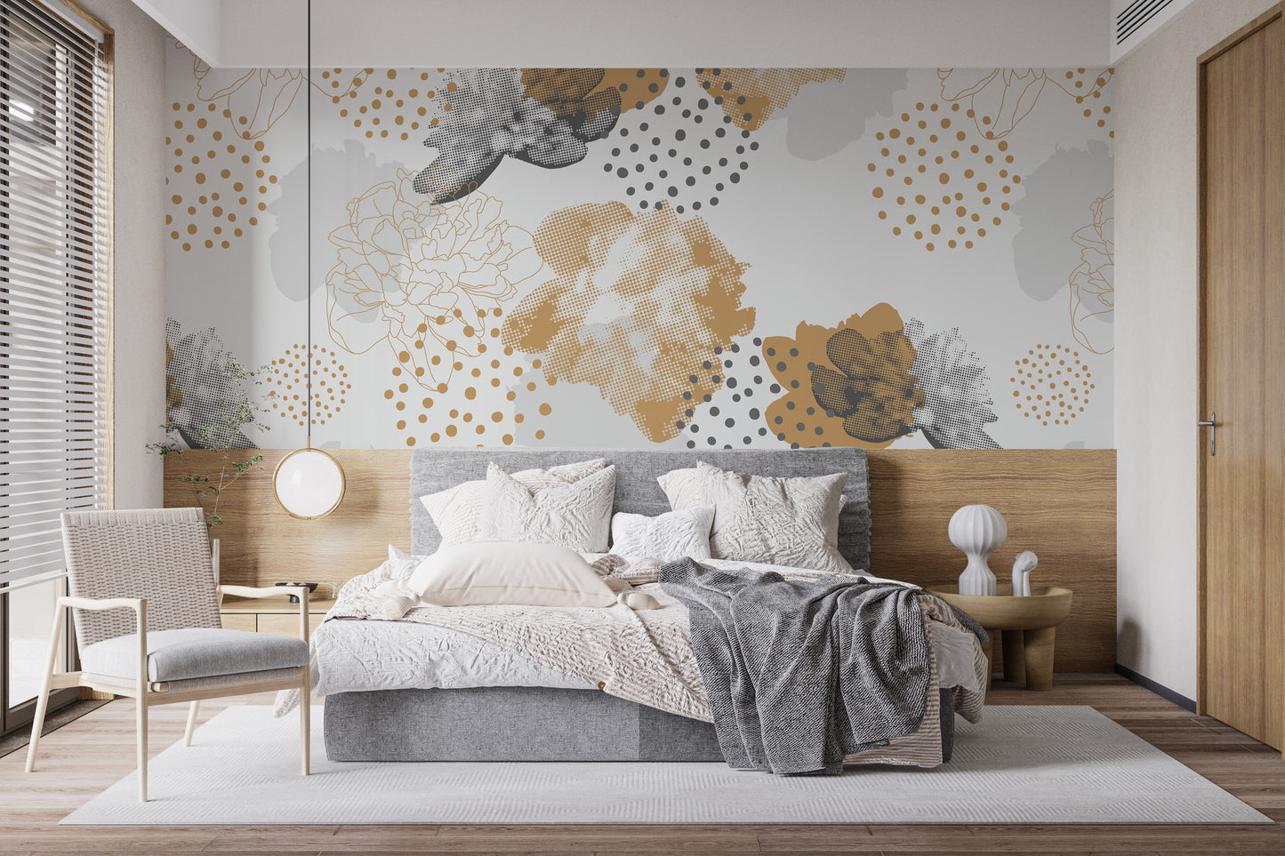 Gold Black Modern Floral wallpaper mural with gold and grey blooms on a pale wall behind a grey bed and woven chair
