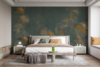 Elegant wallpaper mural featuring shimmering gold leaves
