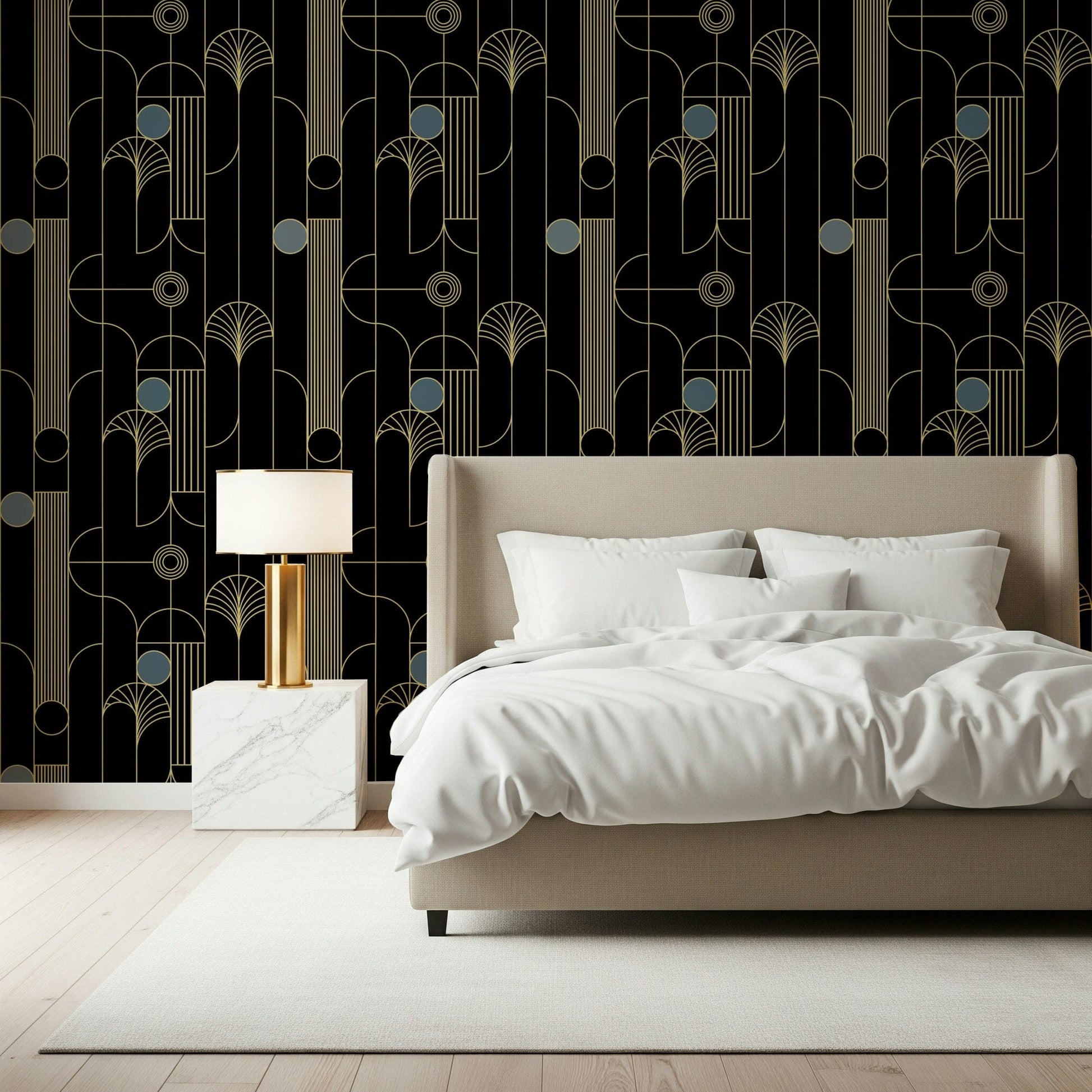 Golden Arcadia Harmony Deco wallpaper in black and gold deco shapes behind a beige upholstered bed with gold lamp