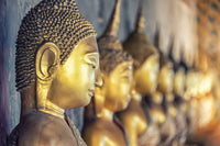 Spiritual statue wallpaper for a minimalist apartment bedroom feature wall.