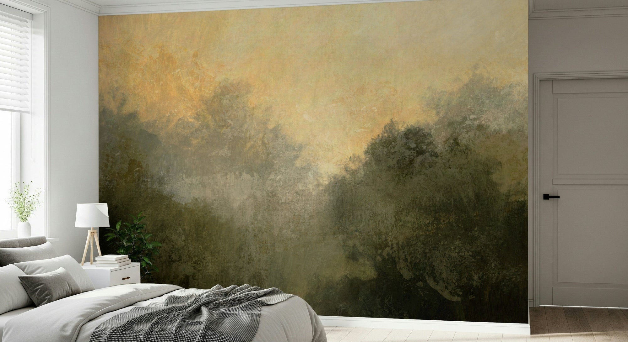 Golden Valley Haze wallpaper mural of misty treetops and amber sky above a grey bed and white nightstand in a bedroom