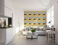 Golden Hour Hues wallpaper in a Scandinavian living room with a white sofa, plaid cushions and open kitchen