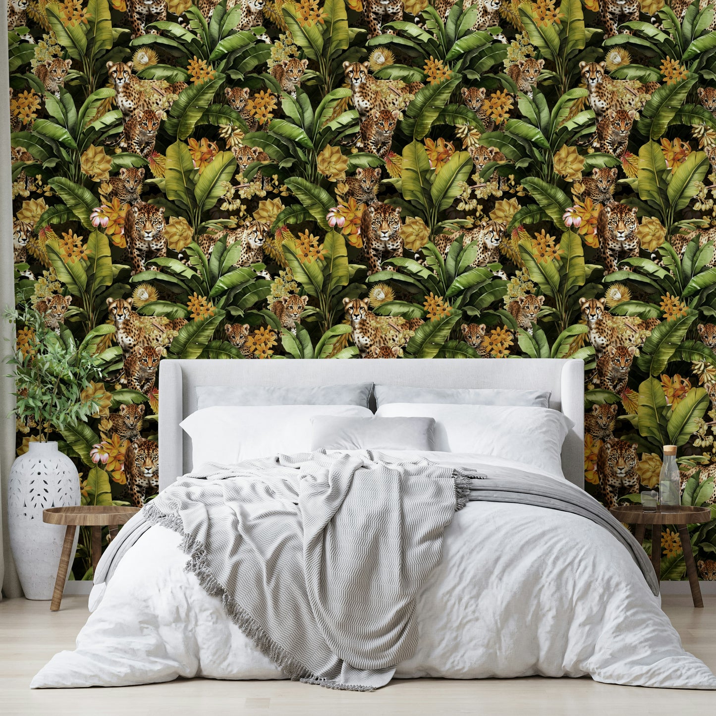 Wallpaper with jungle wildlife and golden foliage for an opulent feel.

