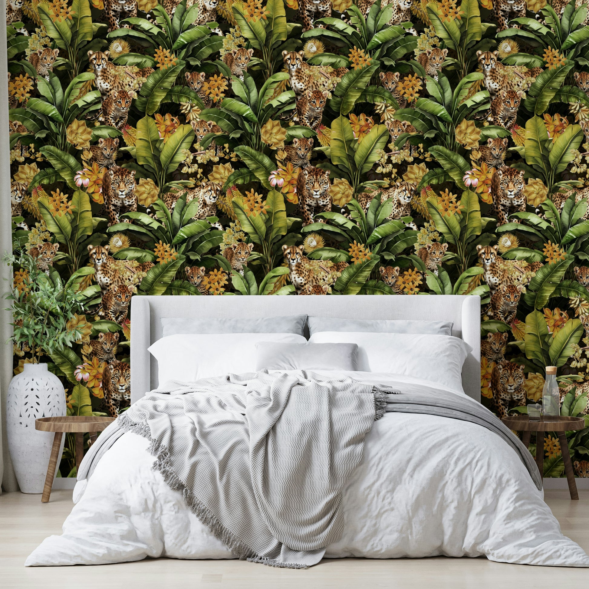 Wallpaper with jungle wildlife and golden foliage for an opulent feel.

