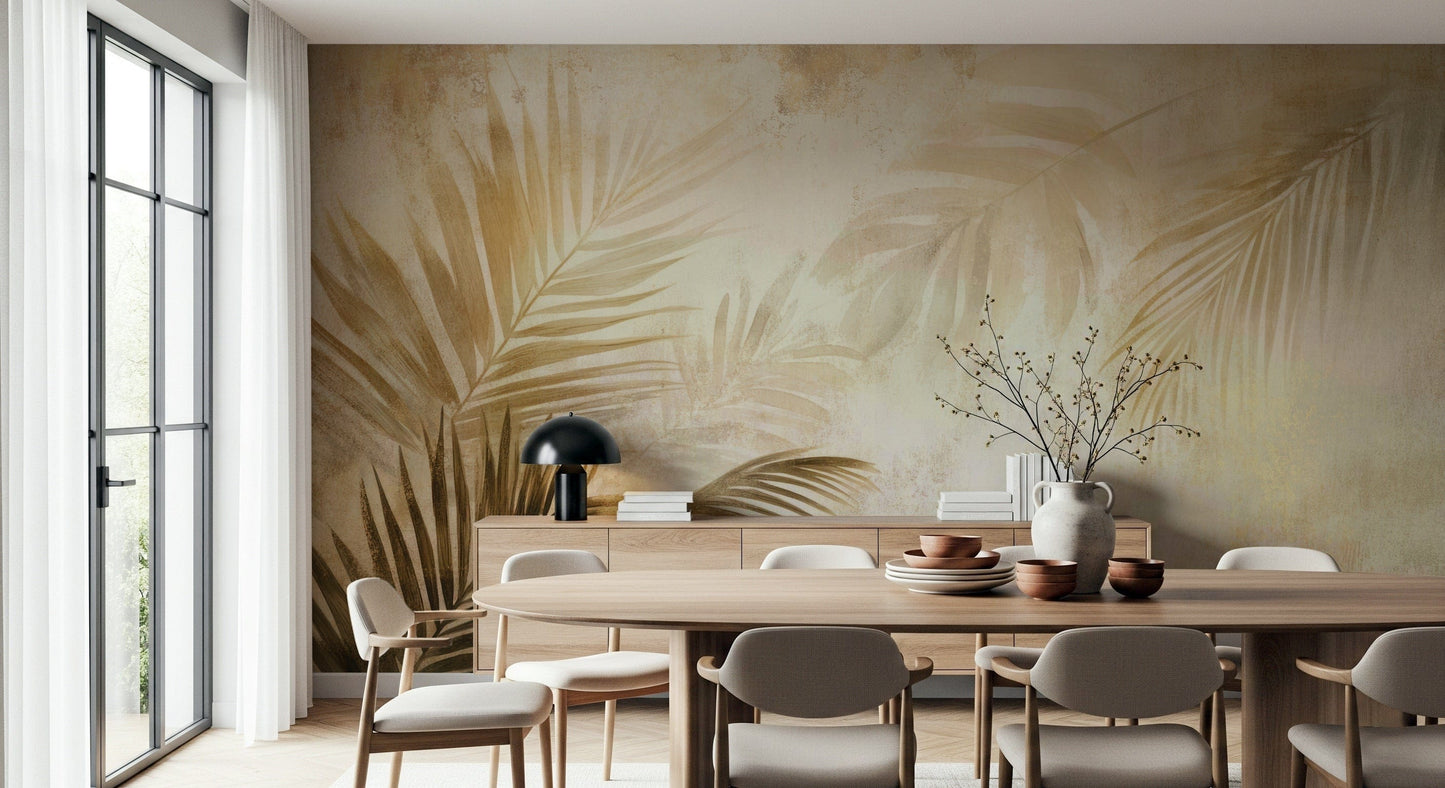 A warm-toned wallpaper with layered palm leaves painted in subtle golden gradients.