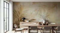 A warm-toned wallpaper with layered palm leaves painted in subtle golden gradients.